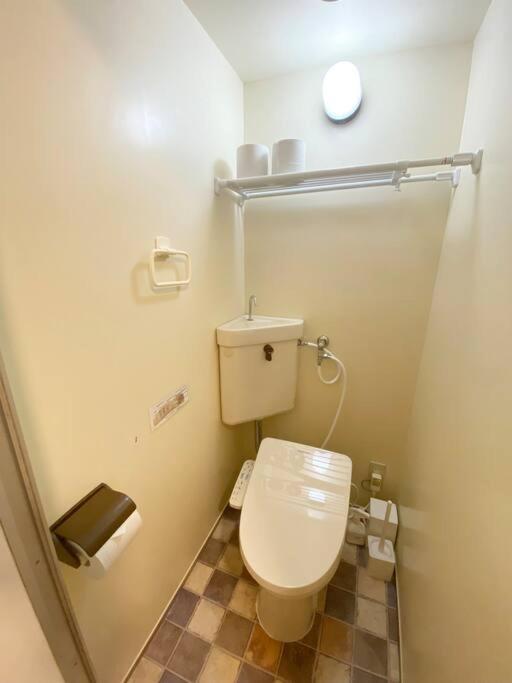 ラ・ポート空港前107 Apartment